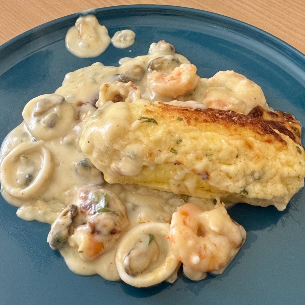 Gratin de quenelles aux fruits de mer